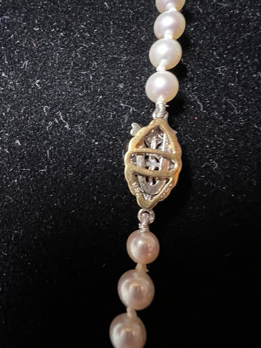 Collier Collier en chute de 71 perles de culture, fermoir en or 18K et diamant 58 Facettes 936