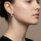 Boucles d'oreilles Crivelli - Boucles d’oreilles entrelacées en or blanc et diamants 58 Facettes 66300073