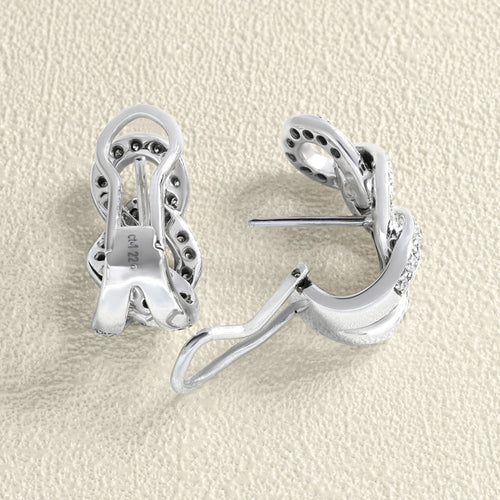 Boucles d'oreilles Crivelli - Boucles d'oreilles en or blanc et diamants 58 Facettes 66300073