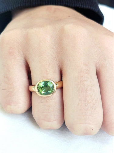 Bague 52 Bague en or jaune 18 carats ornée d’un péridot 58 Facettes 1735045