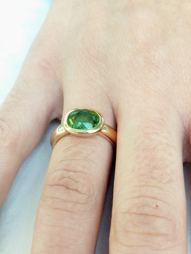 Bague 52 Bague en or jaune 18 carats ornée d’un péridot 58 Facettes 1735045