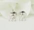 Boucles d'oreilles Boucles d’oreilles - Trio en or blanc 18 carats et diamants 58 Facettes 33674