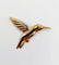 Broche Broche colibri vintage en or jaune 18k 58 Facettes A06928