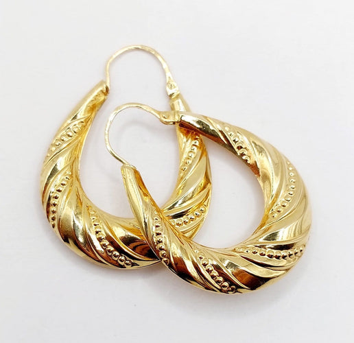 Boucles d'oreilles Créoles XXL vintage à motifs géométriques en or jaune 18k 58 Facettes A06929