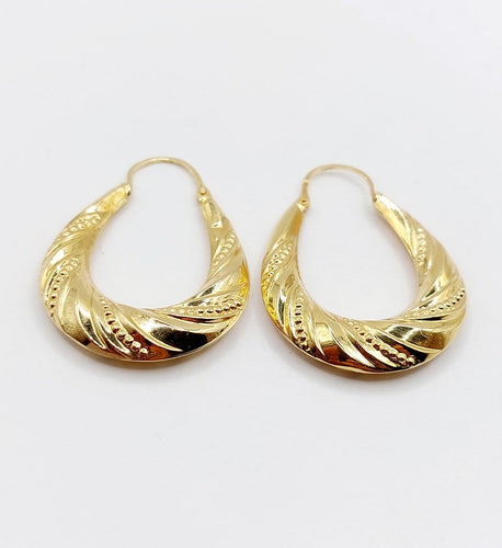 Boucles d'oreilles Créoles XXL vintage à motifs géométriques en or jaune 18k 58 Facettes A06929
