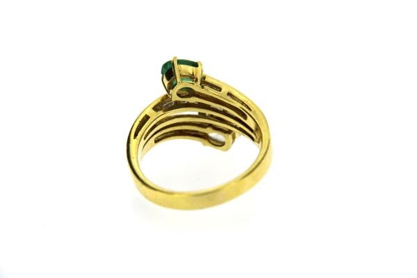 Bague 55 Bague contrarié en or jaune 18 ct avec diamants et émeraude 58 Facettes 13620