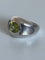 Bague 51 Mauboussin Aloha - Bague en or gris 18k péridot et nacre 58 Facettes LOT 7433