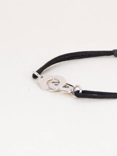 Bracelet DINH VAN Bracelet Menottes R12 or blanc cordon noir 58 Facettes 1215.8