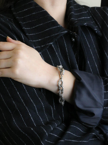 Bracelet HERMES (Attribué à) Bracelet quadrille corde tressé argent 58 Facettes 1266.12
