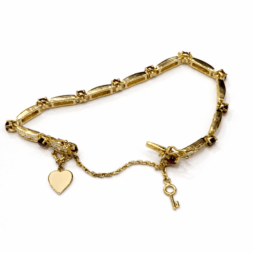Bracelet Bracelet jonc en or jaune 18 carats avec diamants et rubis 58 Facettes Dr