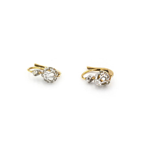 Boucles d'oreilles Boucles d'oreilles dormeuses en or jaune, platine et diamants 58 Facettes 260104R
