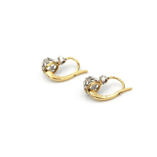 Boucles d'oreilles Boucles d'oreilles dormeuses en or jaune, platine et diamants 58 Facettes 260104R
