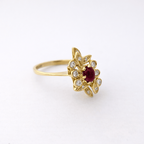 Bague 55 Bague en or jaune 18 carats rubis cabochon et diamants 58 Facettes 35964