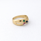 Bague 53 Bague en or jaune 18 carats sertie d’émeraude, saphir et rubis 58 Facettes 35370
