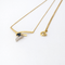 Collier Collier - Pendentif ruban en or jaune 18 carats, saphir et diamants 58 Facettes 35316