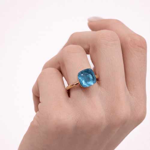 Bague 51 Pomellato Nudo - Bague en or jaune et topaze bleue 58 Facettes 35131