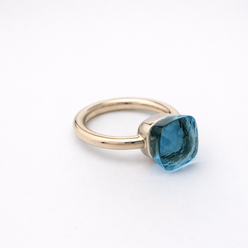 Bague 51 Pomellato Nudo - Bague en or jaune et topaze bleue 58 Facettes 35131