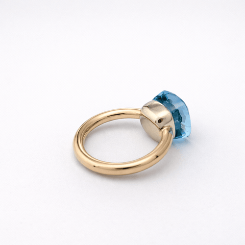 Bague 51 Pomellato Nudo - Bague en or jaune et topaze bleue 58 Facettes 35131
