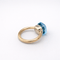 Bague 51 Pomellato Nudo - Bague en or jaune et topaze bleue 58 Facettes 35131