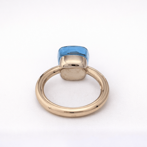 Bague 51 Pomellato Nudo - Bague en or jaune et topaze bleue 58 Facettes 35131