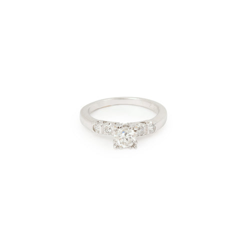 Bague 50 Bague solitaire en or gris 14 carats et diamants 58 Facettes BD169