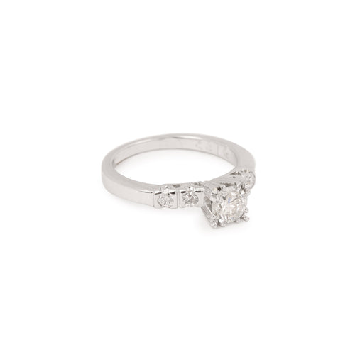 Bague 50 Bague solitaire en or gris 14 carats et diamants 58 Facettes BD169