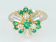 Bague Bague entourage en or jaune 18 ct avec diamants et émeraudes 58 Facettes AX01