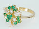 Bague Bague entourage en or jaune 18 ct avec diamants et émeraudes 58 Facettes AX01