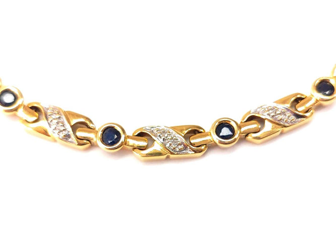 Bracelet Bracelet en or jaune 18K serti de diamants et saphirs 58 Facettes RIV-2129.2