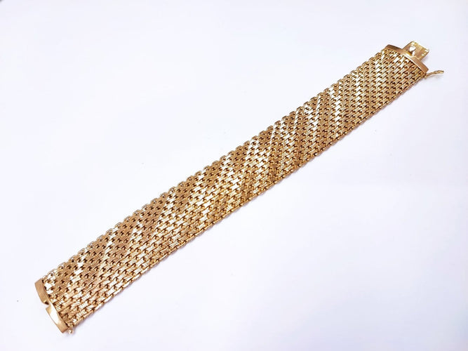 Bracelet Bracelet manchette en or jaune 18 carats 58 Facettes Brac.iris.1974