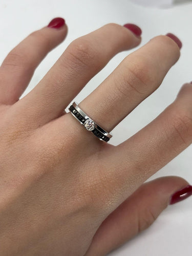 Bague 52 Boucheron Quatre - Bague solitaire en or blanc 18K, diamant et onyx 58 Facettes 1804