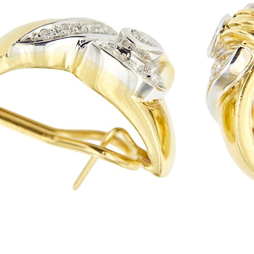 Boucles d'oreilles Damiani - Boucles d’oreilles puces en or jaune et or blanc avec diamants 58 Facettes 39164
