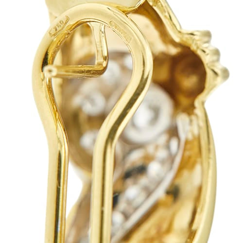 Boucles d'oreilles Damiani - Boucles d’oreilles puces en or jaune et or blanc avec diamants 58 Facettes 39164