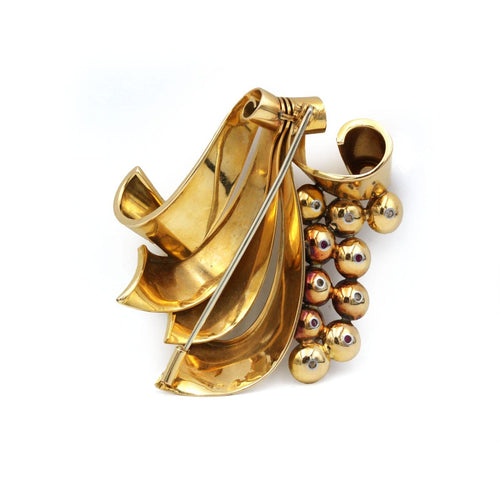 Broche Broche à volutes en or jaune, platine, diamants et rubis 58 Facettes 260024SP