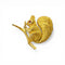 Broche Hermès - Broche écureuil vintage en or jaune et rubis 58 Facettes
