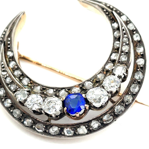 Broche Broche croissant de lune - Diamants et saphir de synthèse en or rose 58 Facettes 00344