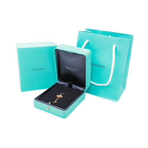 Pendentif Tiffany & Co Pendentif Clé fleur de Lys Or rose Diamant, Nacre 58 Facettes 4390263RV