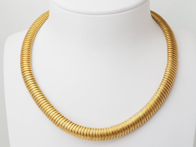 Collier Collier tubogas vintage en or jaune 18 carats 58 Facettes 33719