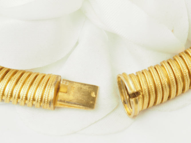 Collier Collier tubogas vintage en or jaune 18 carats 58 Facettes 33719