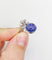 Bague 48 Bague duchesse vintage en or blanc 18k, tanzanite cabochon et diamants 58 Facettes A06916