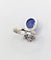 Bague 48 Bague duchesse vintage en or blanc 18k, tanzanite cabochon et diamants 58 Facettes A06916