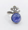 Bague 48 Bague duchesse vintage en or blanc 18k, tanzanite cabochon et diamants 58 Facettes A06916