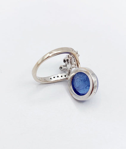 Bague 48 Bague duchesse vintage en or blanc 18k, tanzanite cabochon et diamants 58 Facettes A06916