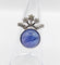 Bague 48 Bague duchesse vintage en or blanc 18k, tanzanite cabochon et diamants 58 Facettes A06916