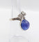 Bague 48 Bague duchesse vintage en or blanc 18k, tanzanite cabochon et diamants 58 Facettes A06916