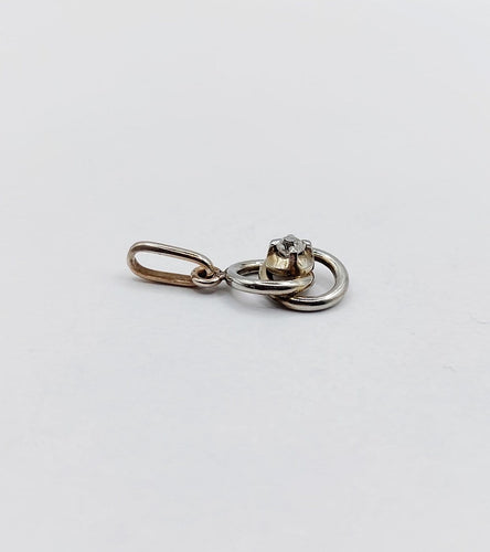 Pendentif Pendentif antique nœud infini en or blanc 18k et diamant (circa 1920) 58 Facettes A06948