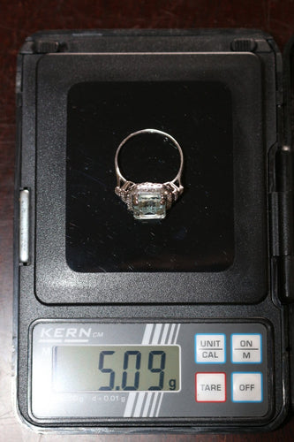 Bague 61 Bague Art déco en or blanc, aigue-marine et diamants 58 Facettes 610
