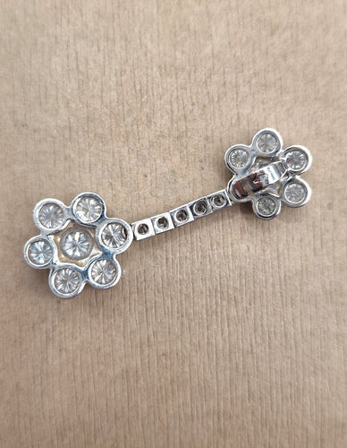 Pendentif Pendentif fleur en or blanc 18 ct et diamants 58 Facettes CV-030
