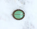 Broche Broche ancienne chrysoprase et diamants en or rose et argent 58 Facettes
