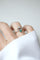 Bague 51 Bague nœud Duchesse Belle Époque en or jaune et platine, émeraude et diamants 58 Facettes